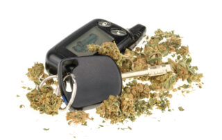 driving high, marijuana and car key isolated on white